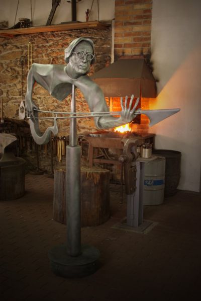 Bluesman - kinetic forged sculpture (2016). Material: metal, granit - height 1.8 m.